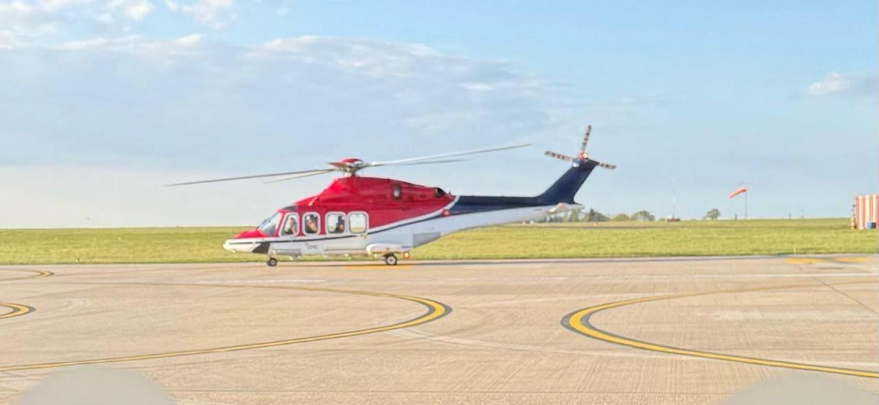 Luxury Arrival: Chauffeur Collection from Private Helicopter Landing